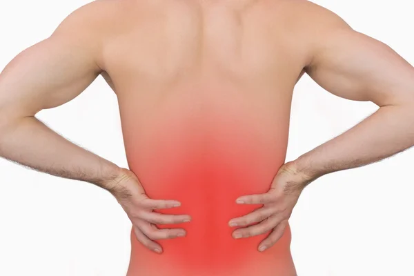 Rear view of muscular man with backache — Stock Photo, Image