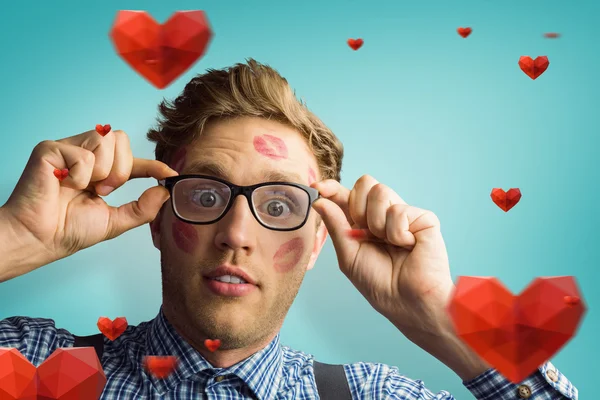 Geeky hipster covered in kisses — Stock Photo, Image