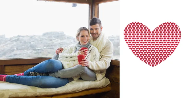 Pareja en invierno desgaste con tazas de café —  Fotos de Stock