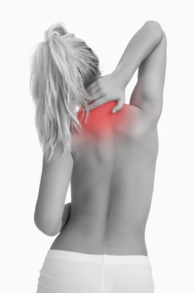 Вид сзади топлесс женщины с болью в шее — стоковое фото