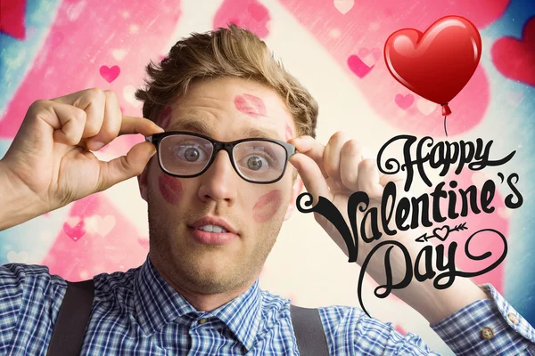 Geeky hipster covered in kisses — Stock Photo, Image