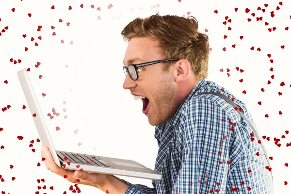 Geeky businessman using his laptop — Stock Photo, Image