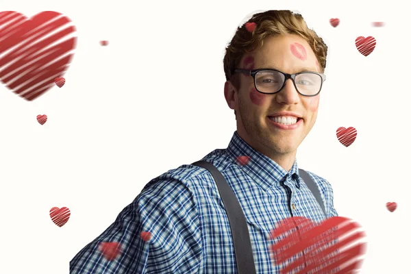 Geeky hipster covered in kisses — Stock Photo, Image