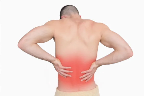 Rear view of shirtless man with back pain — Stock Photo, Image