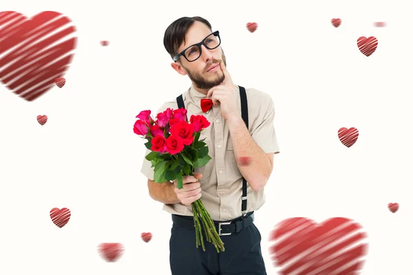 Geeky hipster offering bunch of roses — Stock Photo, Image