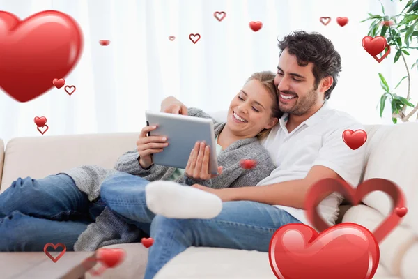 Couple using a tablet computer