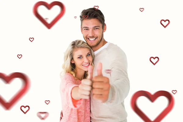 Couple showing thumbs up — Stock Photo, Image