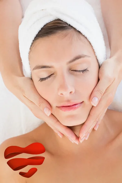 Attractive woman receiving facial massage — Stock Photo, Image