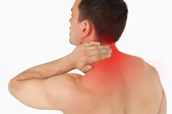 Young man experiencing neck pain — Stock Photo, Image