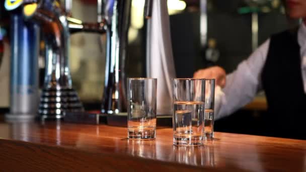 Bartender in uniform cleaning — Stock Video