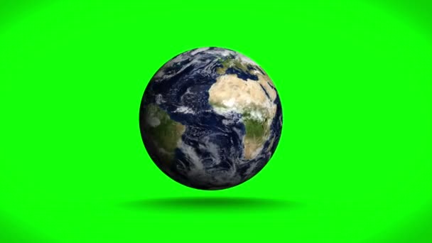 Earth spinning on green background — Stock Video