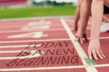 Composite image of cropped people ready to race on track field clipart