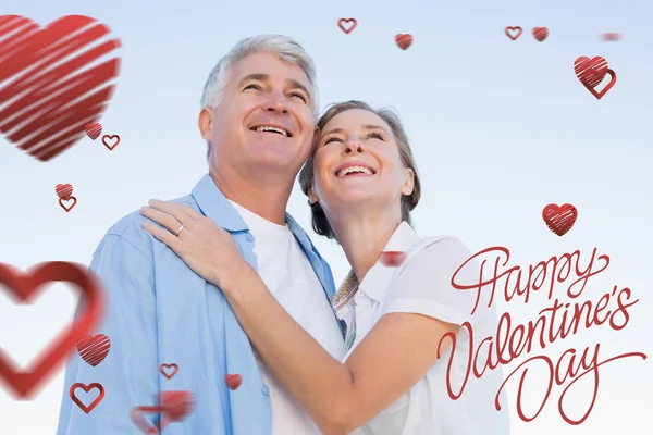 Composite image of cute valentines couple — Stock Photo, Image