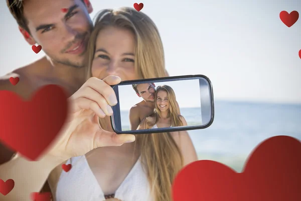 Zusammengesetztes Bild des Valentinspaares — Stockfoto