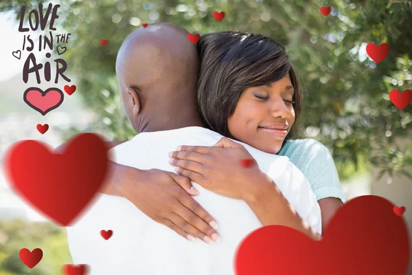 Composite image of cute valentines couple — Stock Photo, Image