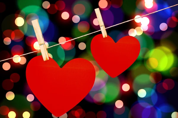 Composite image of hearts hanging on a line — Stock Photo, Image