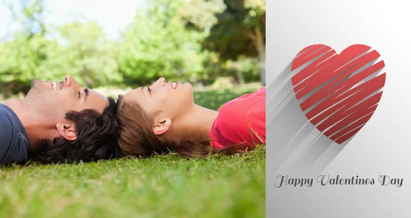 Composite image of cute valentines couple — Stock Photo, Image