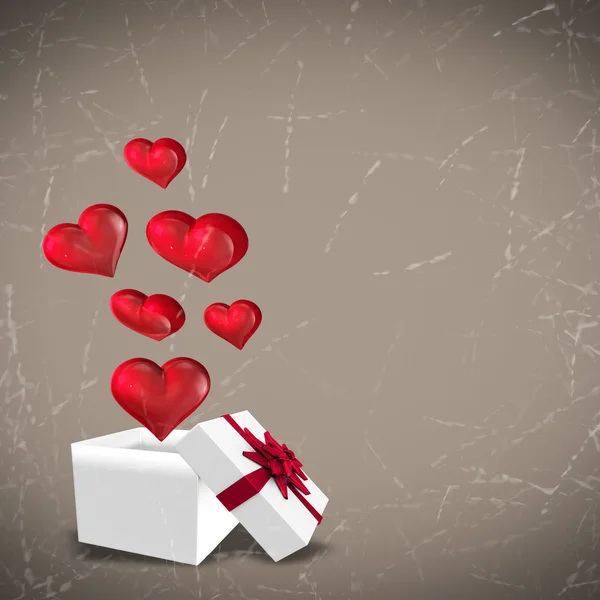 Composite image of hearts flying from box — Stock Photo, Image