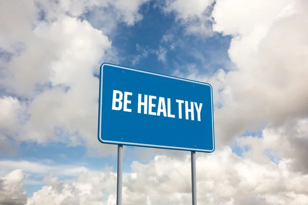 Be healthy against blue sky with white clouds — Stock Photo, Image