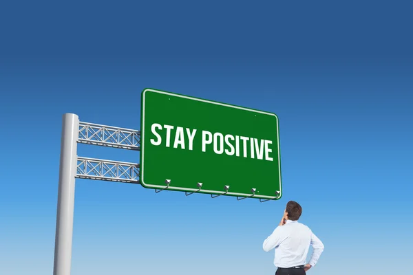 Word stay positive and thinking businessman — Stock Photo, Image