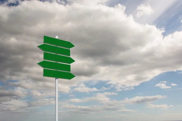 Composite image of green signpost — Stock Photo, Image