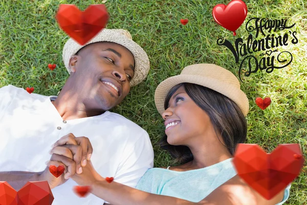 Composite image of cute valentines couple — Stock Photo, Image