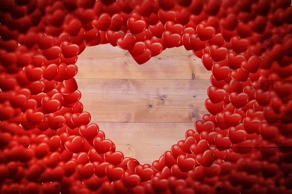 Zusammengesetztes Bild roter Liebesherzen — Stockfoto