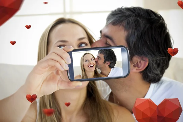 Zusammengesetztes Bild des Valentinspaares — Stockfoto