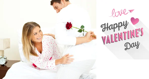 Composite image of cute valentines couple — Stock Photo, Image