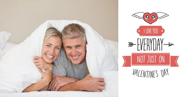 Composite image of cute valentines couple — Stock Photo, Image