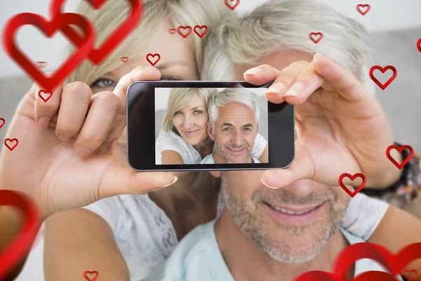 Zusammengesetztes Bild des Valentinspaares — Stockfoto