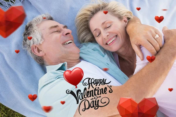 Imagen compuesta de linda pareja de San Valentín — Foto de Stock