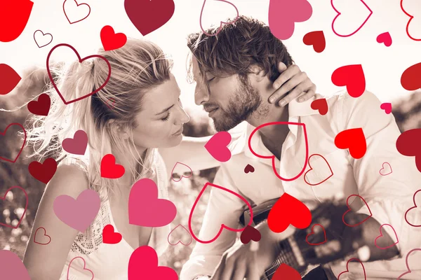 Composite image of cute valentines couple — Stock Photo, Image