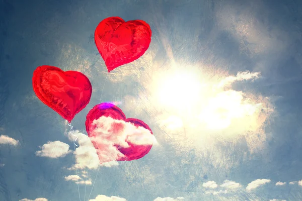 Zusammengesetztes Bild von Herzballons — Stockfoto