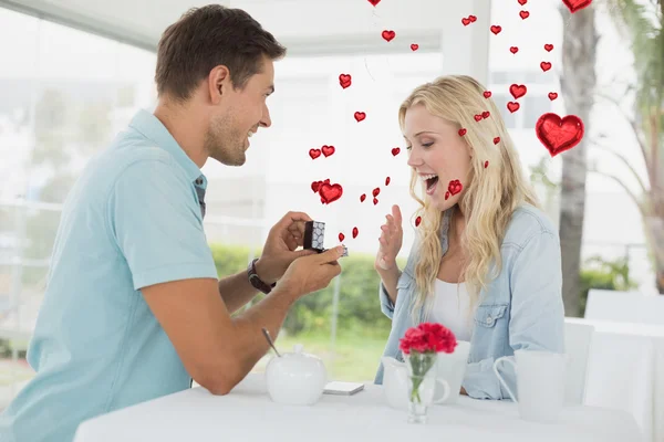 Composite image of cute valentines couple — Stock Photo, Image