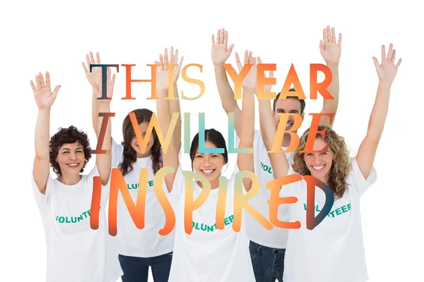 Group of volunteers raising arms — Stock Photo, Image