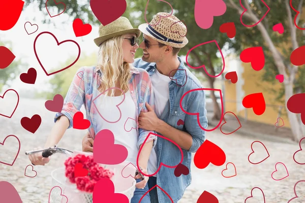 Composite image of cute valentines couple — Stock Photo, Image