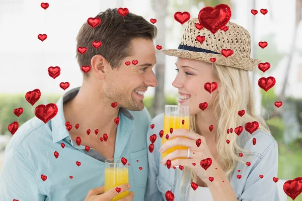 Composite image of cute valentines couple — Stock Photo, Image