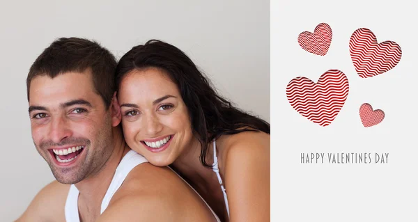 Composite image of cute valentines couple — Stock Photo, Image