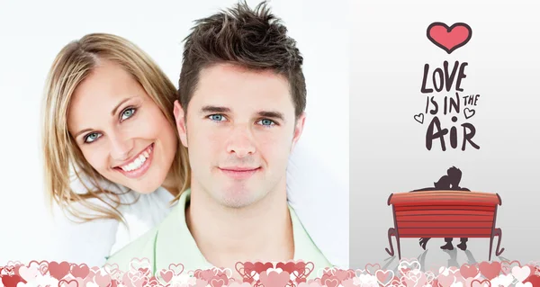 Composite image of cute valentines couple — Stock Photo, Image