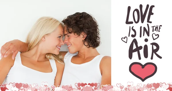 Composite image of cute valentines couple — Stock Photo, Image