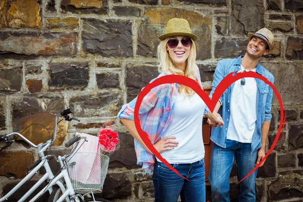 Composite image of cute valentines couple — Stock Photo, Image