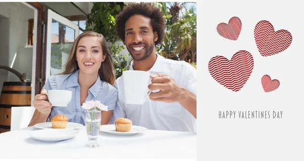 Composite image of cute valentines couple — Stock Photo, Image