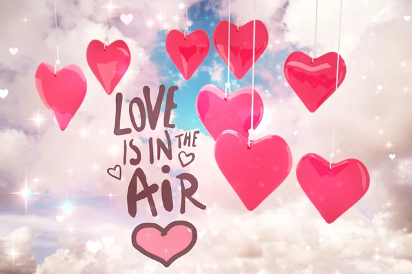 Samengestelde afbeelding van liefde is in de lucht — Stockfoto