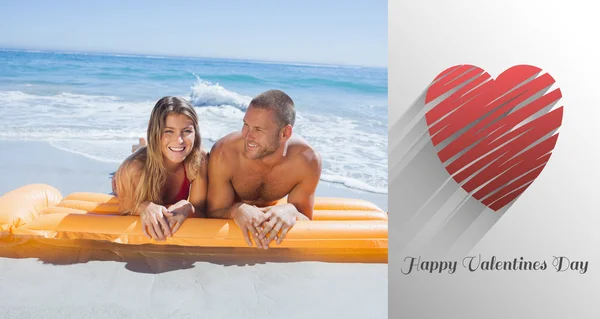 Composite image of cute valentines couple — Stock Photo, Image