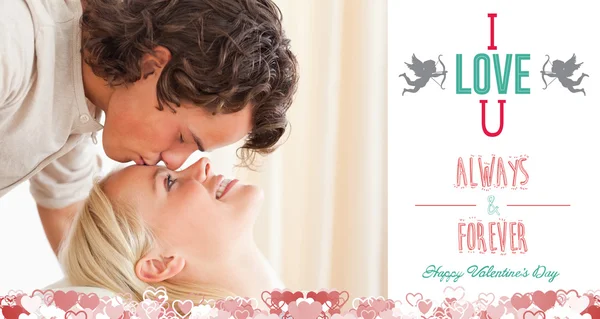 Composite image of cute valentines couple — Stock Photo, Image