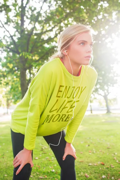 Active serious blonde catching her breath — Stock Photo, Image