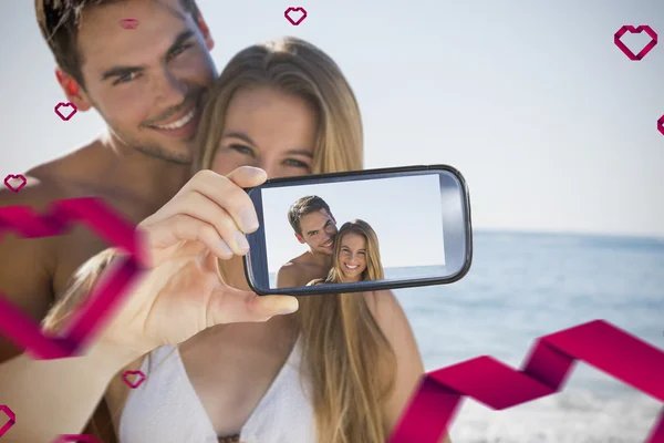 Zusammengesetztes Bild des Valentinspaares — Stockfoto