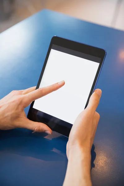 Young student using his tablet in cafe — Stock Photo, Image