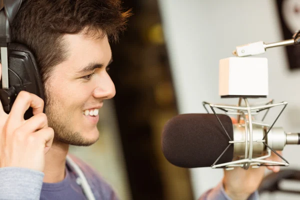 Portrait of an university student recording audio — Stock Photo, Image